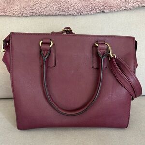 Crossbody or hand bag.